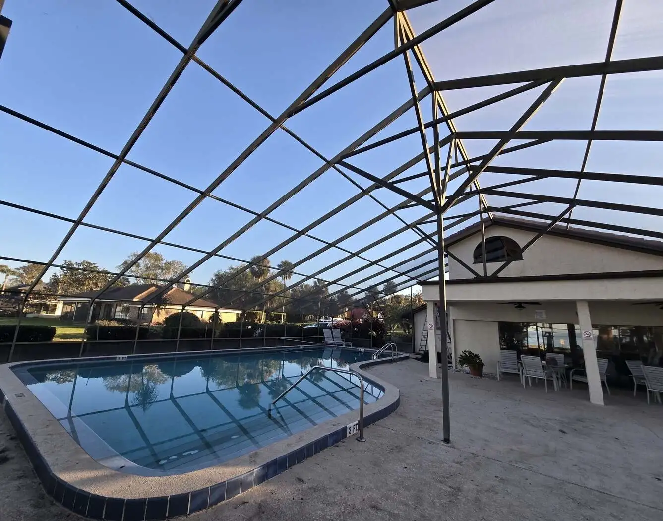 Lanai and pool enclosure screen repair in Orlando with aluminum frame structure