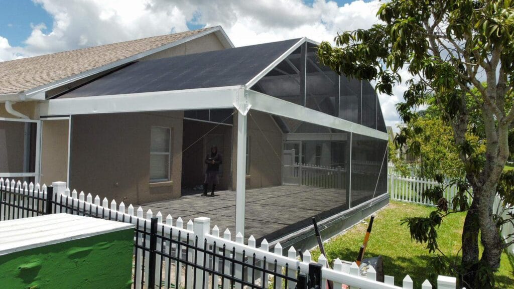 "Aluminum patio enclosure with clear panels in St. Cloud, Florida"